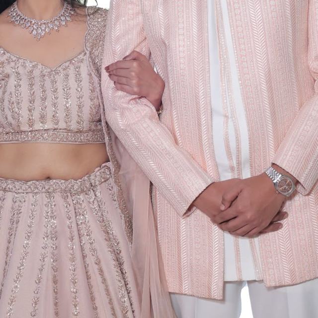 The couple arm in arm, sample photo