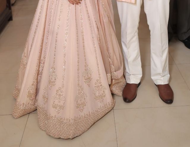 The couple's wedding outfits, sample photo